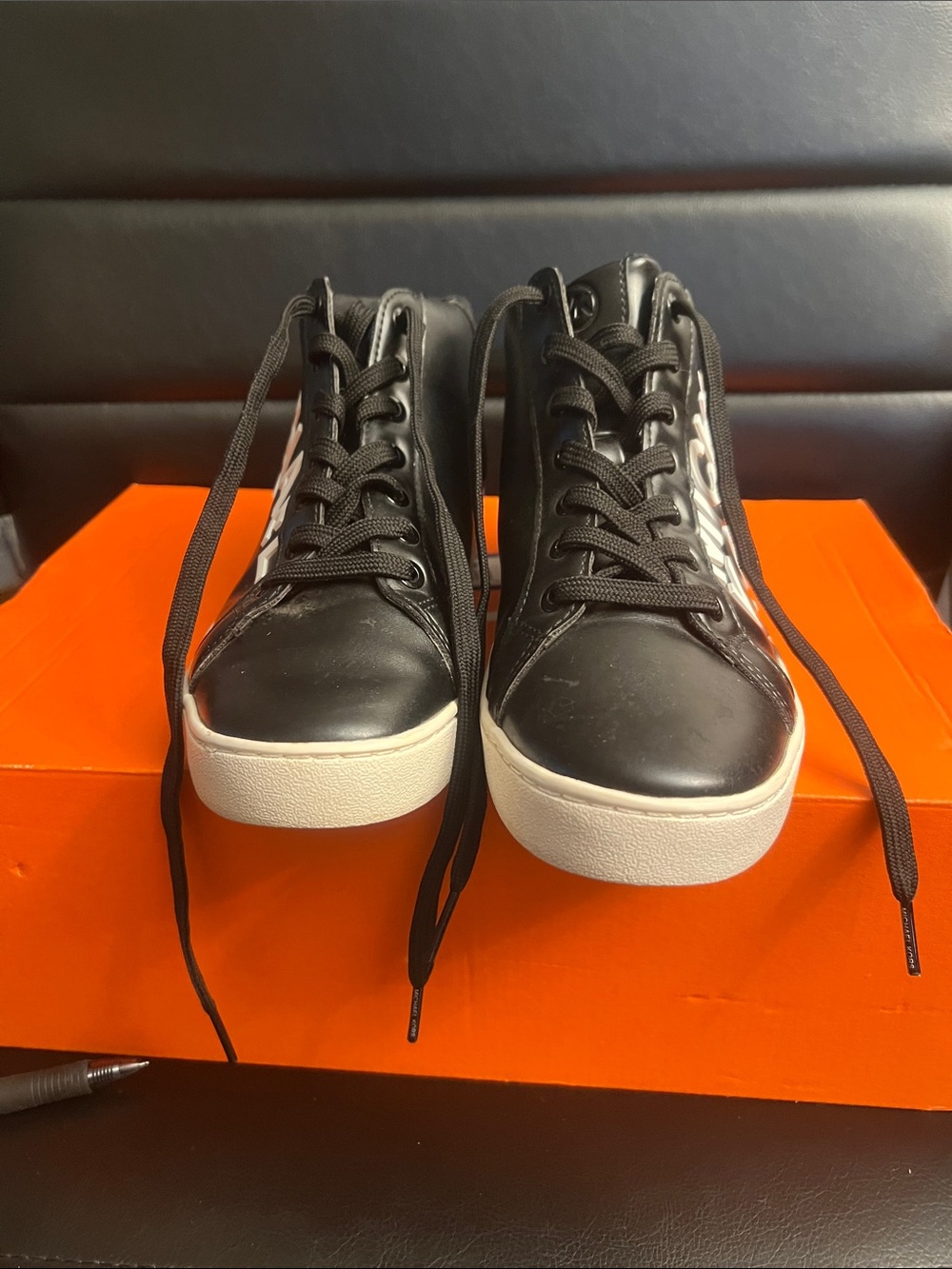 Michael Kors Black Leather High-Top Sneakers with White Sole